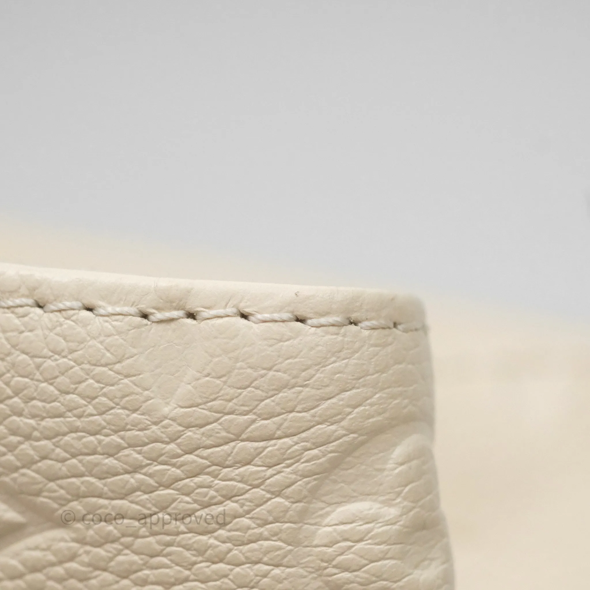 Louis Vuitton Backup Cream Monogram Empreinte Leather