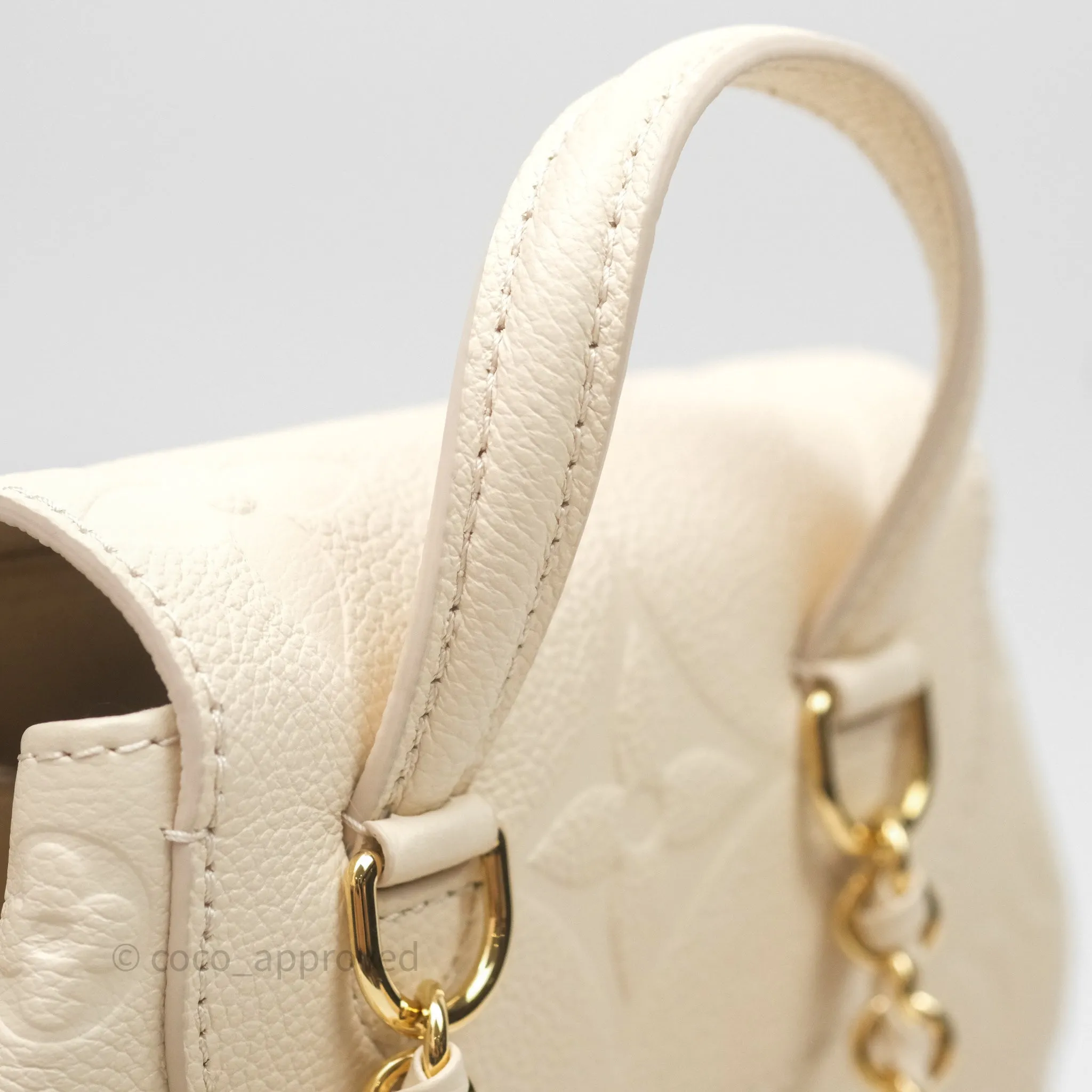 Louis Vuitton Backup Cream Monogram Empreinte Leather