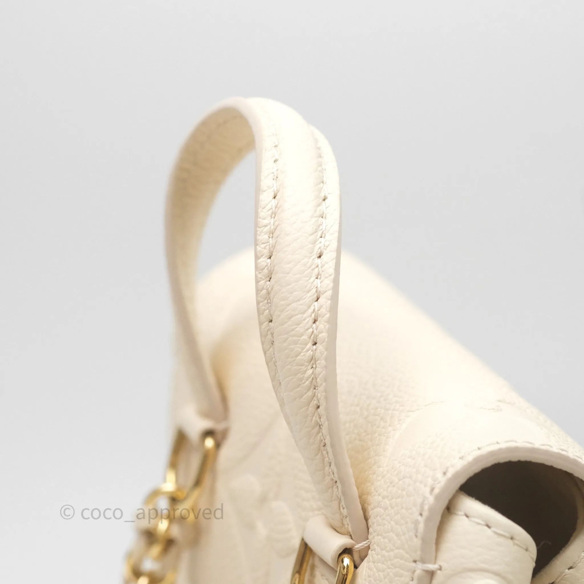 Louis Vuitton Backup Cream Monogram Empreinte Leather