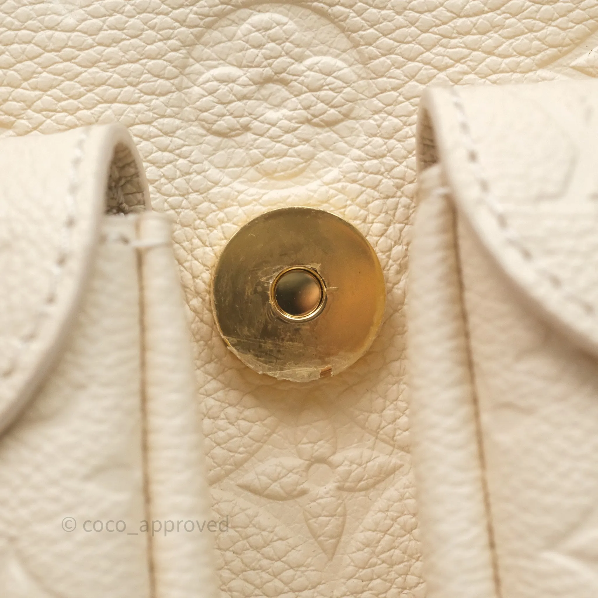 Louis Vuitton Backup Cream Monogram Empreinte Leather