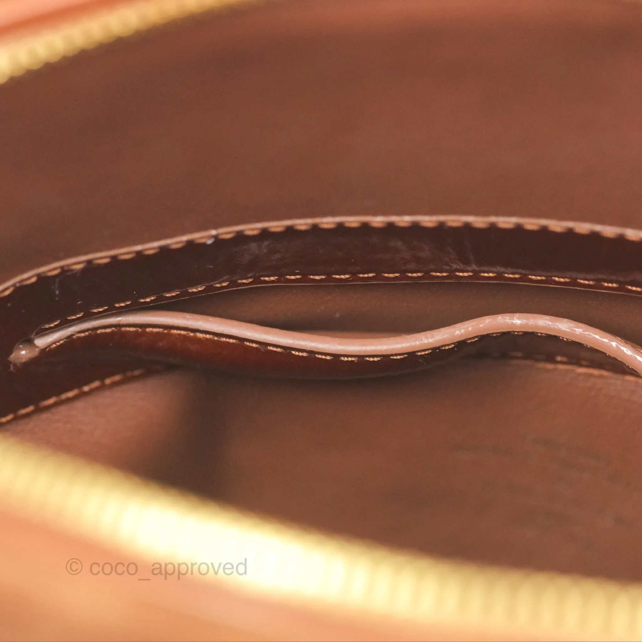 Louis Vuitton Lockit Shearling Pulsion Brown