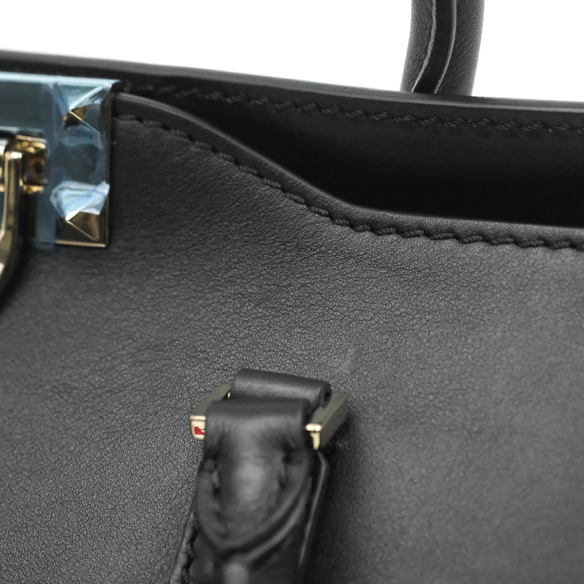Valentino Garavani Rockstud Mini Trapeze Shoulder Bag Black Calfskin Gold Hardware