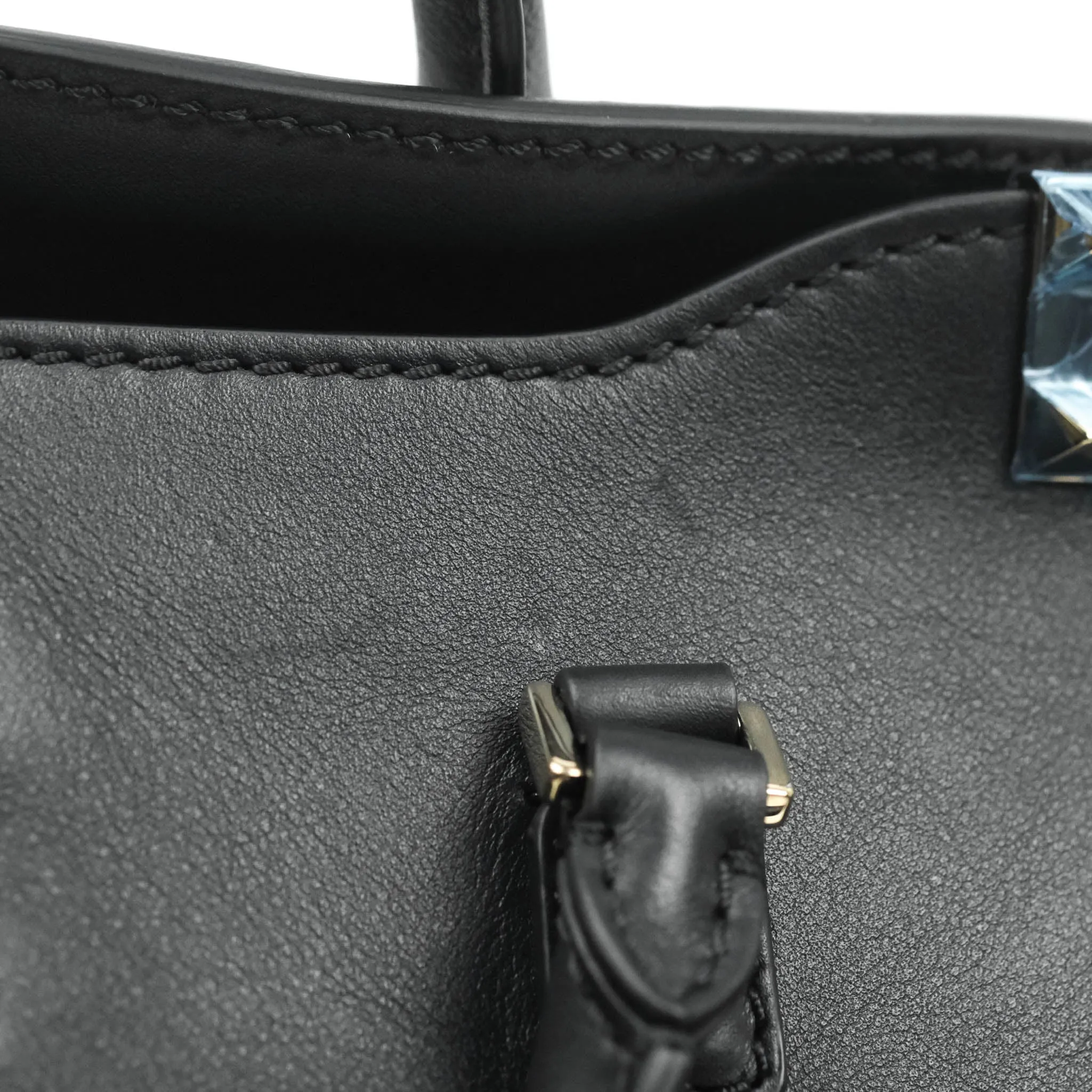 Valentino Garavani Rockstud Mini Trapeze Shoulder Bag Black Calfskin Gold Hardware