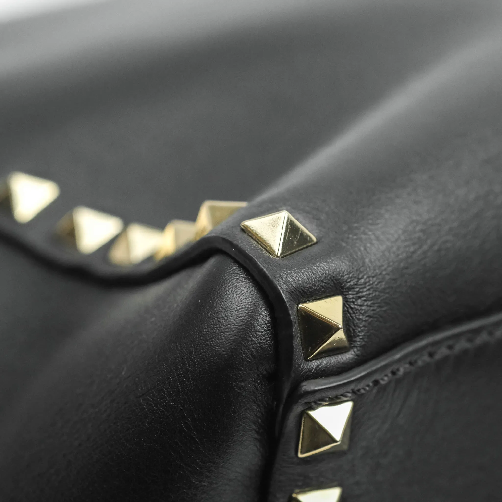 Valentino Garavani Rockstud Mini Trapeze Shoulder Bag Black Calfskin Gold Hardware