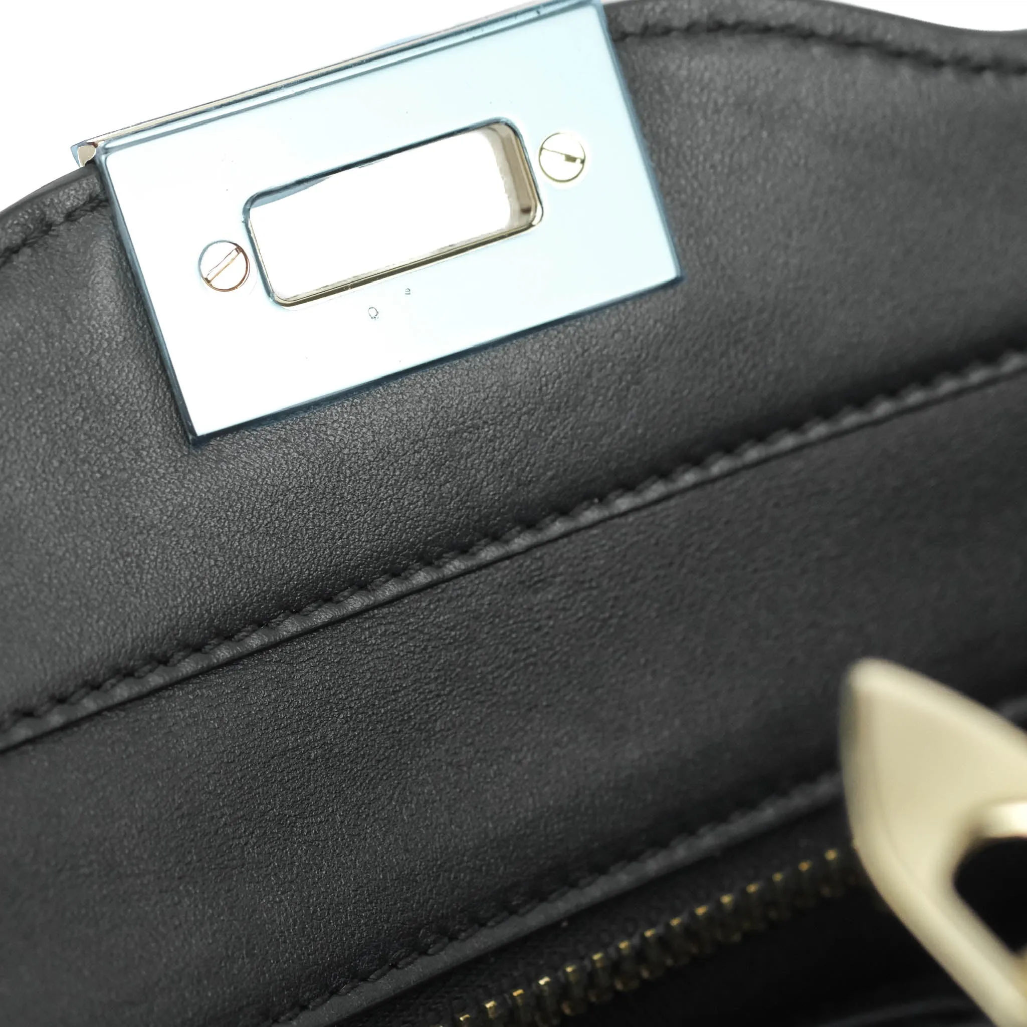 Valentino Garavani Rockstud Mini Trapeze Shoulder Bag Black Calfskin Gold Hardware