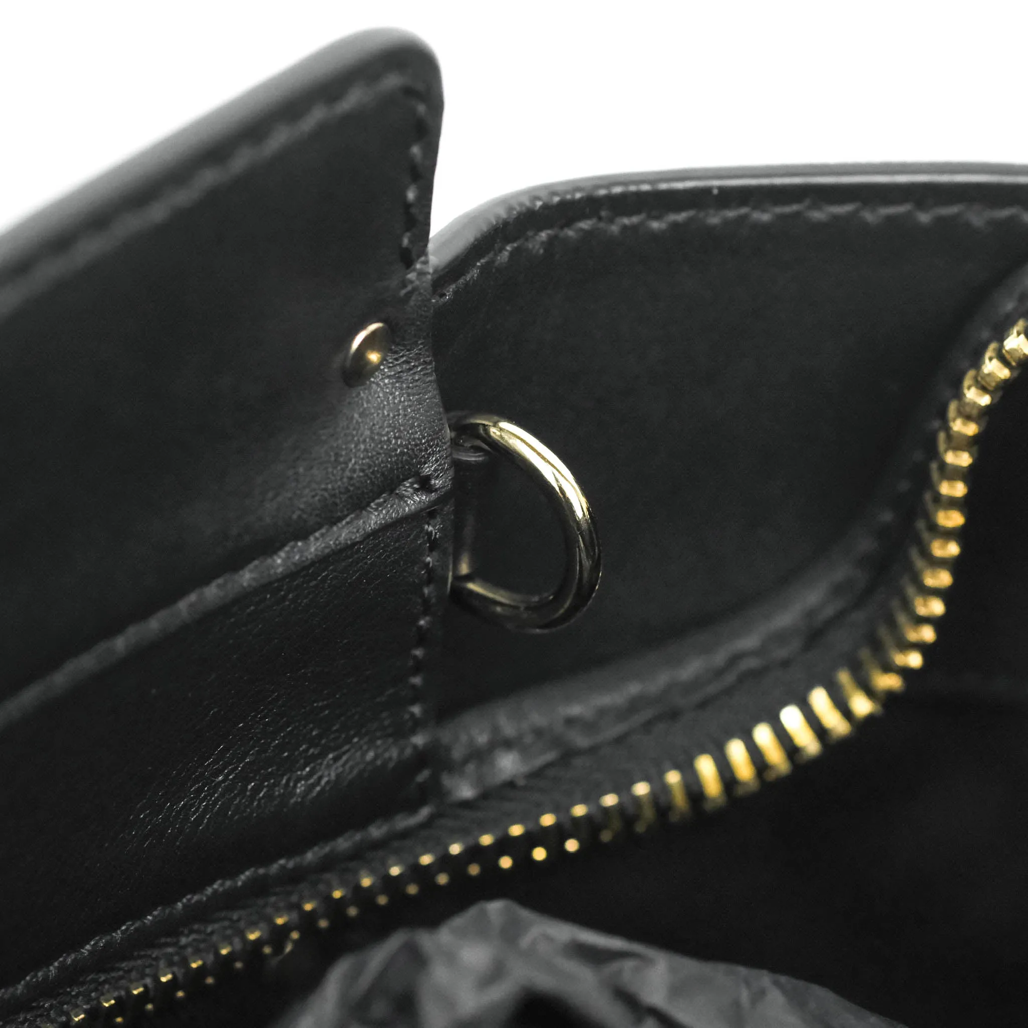 Valentino Garavani Rockstud Mini Trapeze Shoulder Bag Black Calfskin Gold Hardware
