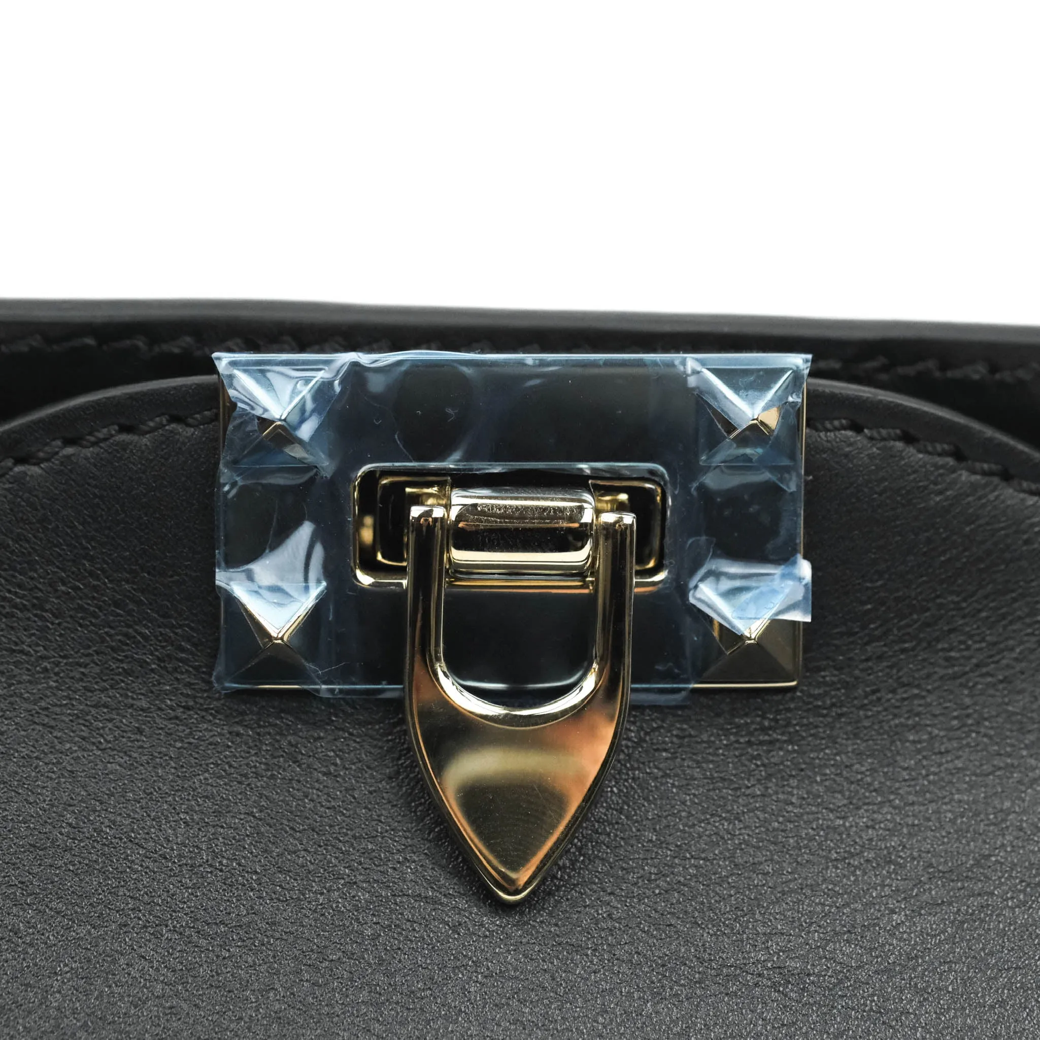 Valentino Garavani Rockstud Mini Trapeze Shoulder Bag Black Calfskin Gold Hardware