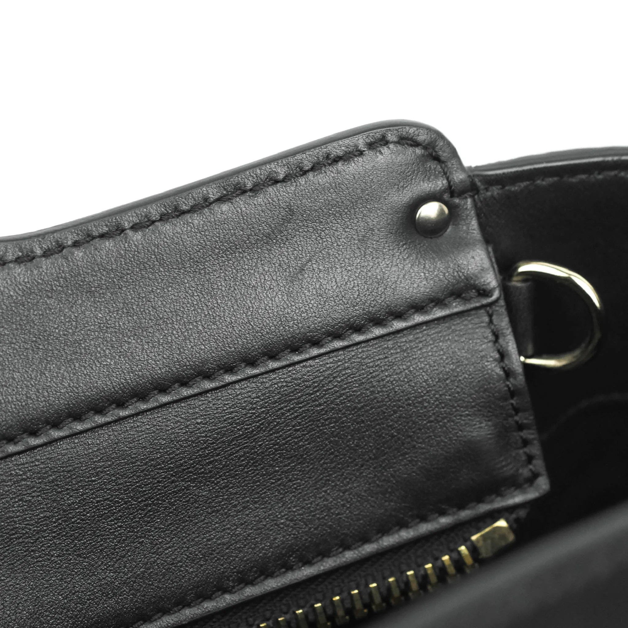 Valentino Garavani Rockstud Mini Trapeze Shoulder Bag Black Calfskin Gold Hardware