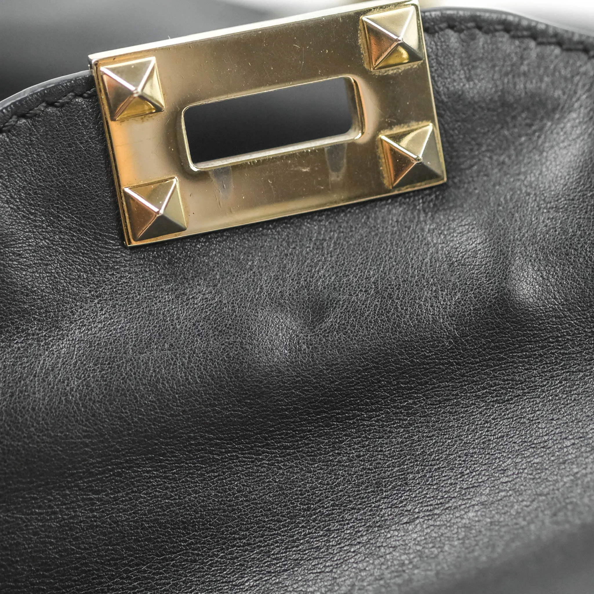Valentino Garavani Small Trapeze Rockstud Black Grained Calfskin Gold Hardware